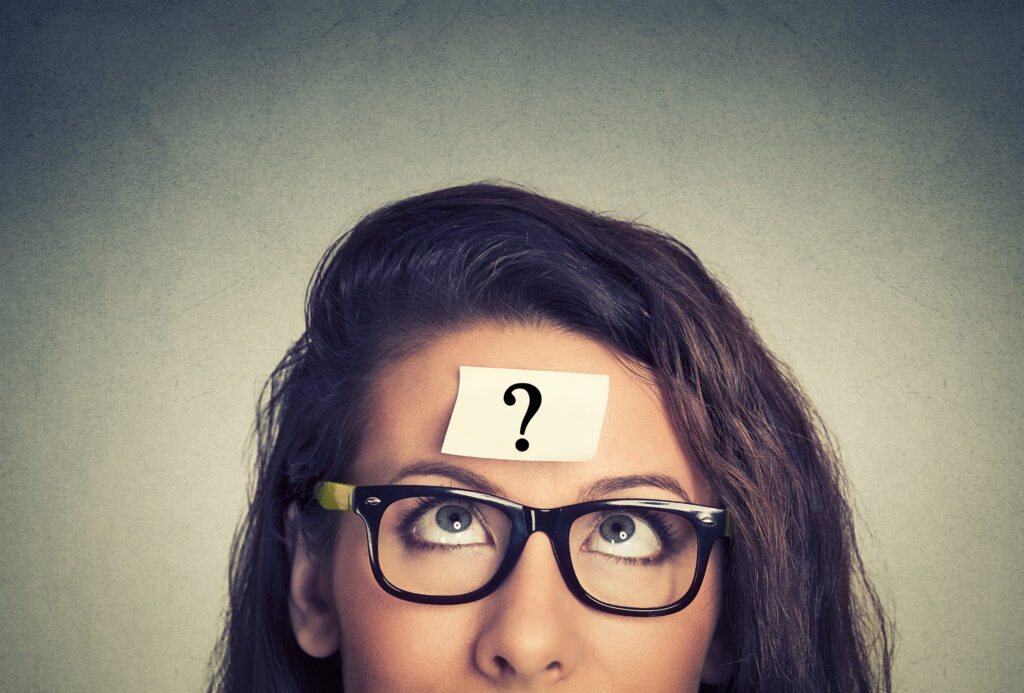 Thinking,Woman,With,Question - top theology questions